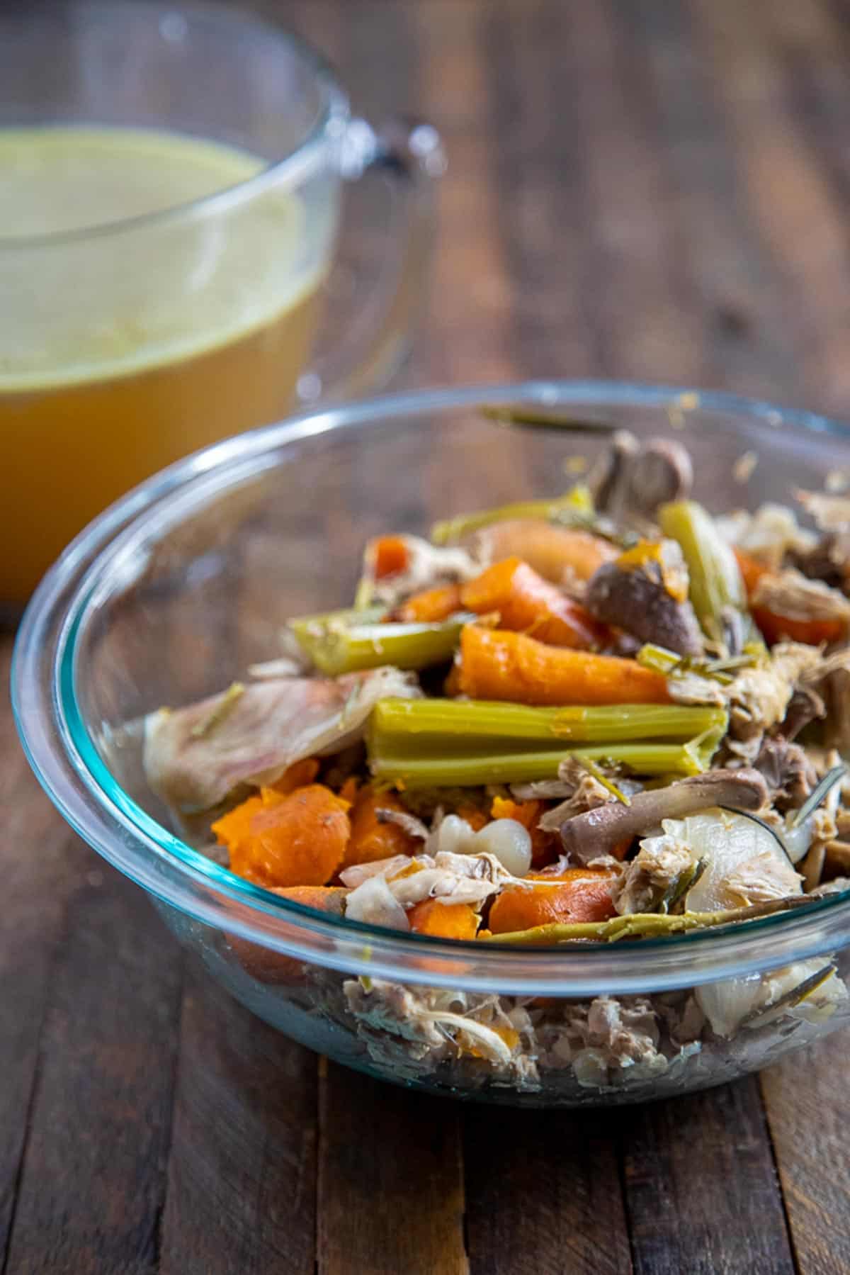 bowl of cooked vegetables used for making chicken stock
