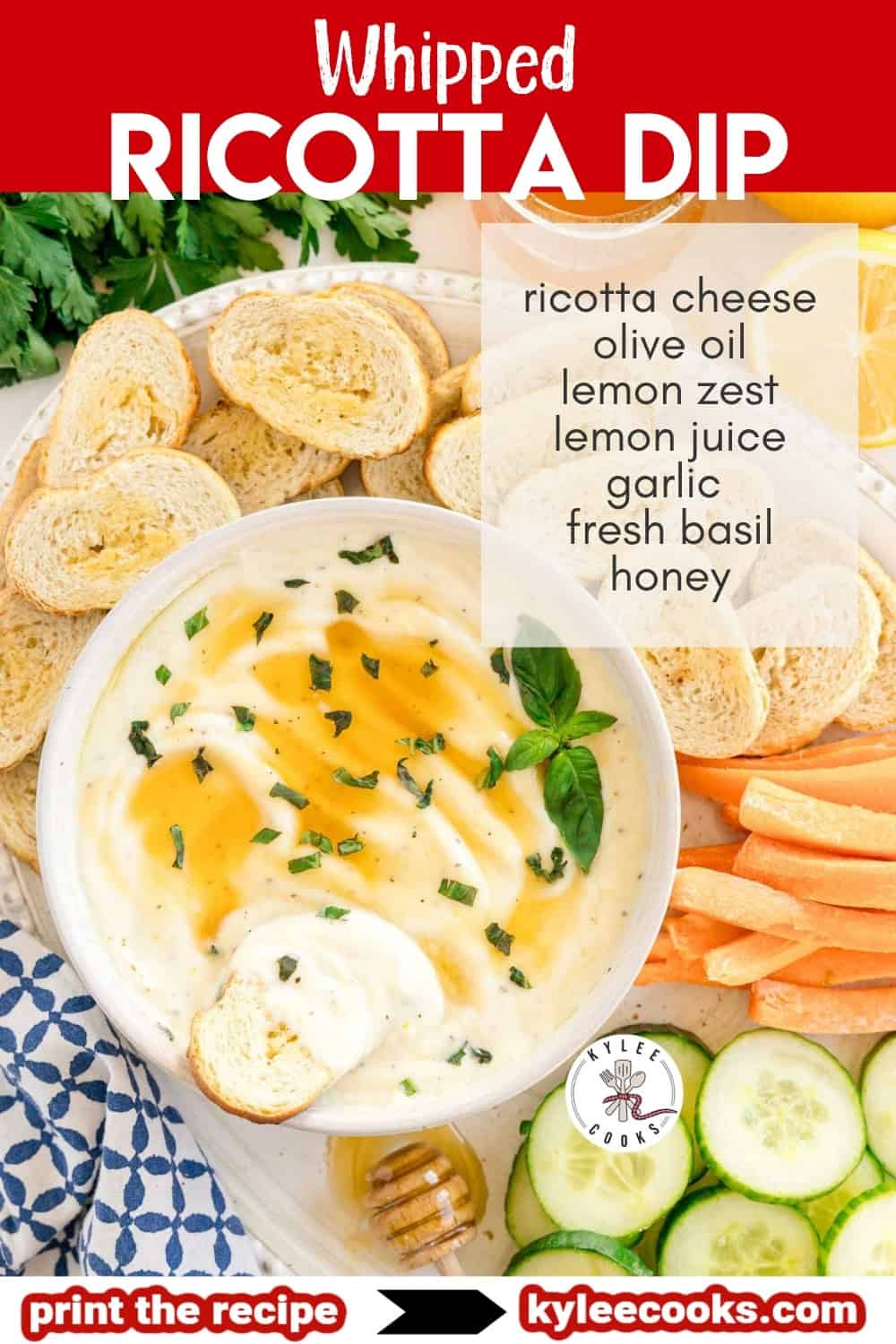 Bowl of whipped ricotta dip with honey drizzle and basil, surrounded by toasted bread, cucumber slices, and carrot sticks. Text on the image lists ricotta cheese, olive oil, lemon zest, lemon juice, garlic, fresh basil, and honey.
