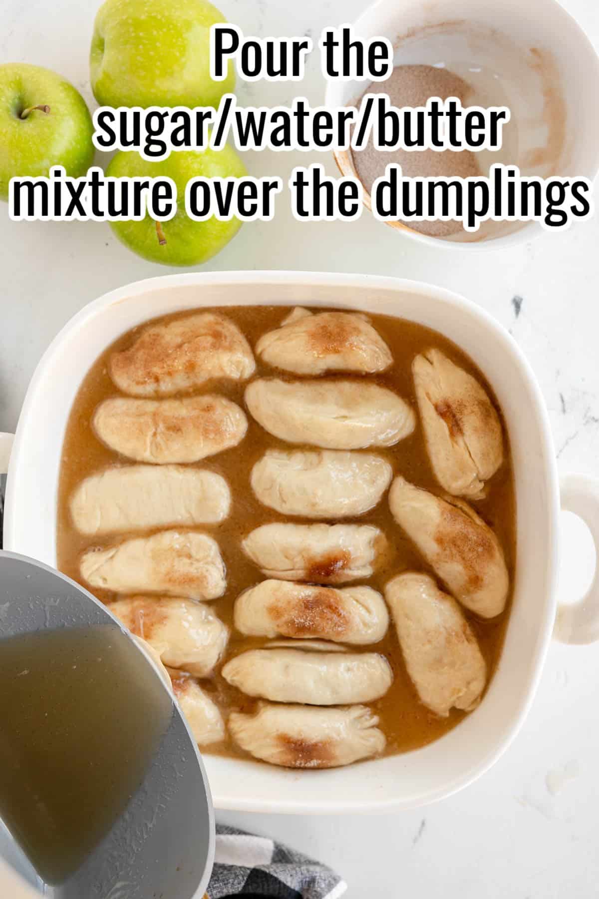 A dish of dumplings is shown with a sugar, water, and butter mixture being poured over them. Green apples and a bowl of sugar are in the background. Text on the image gives pouring instructions.
