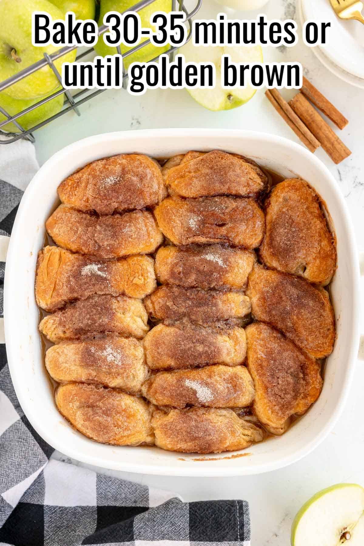 A baking dish filled with golden brown rolls topped with cinnamon and sugar. The text above reads, "Bake 30-35 minutes or until golden brown.