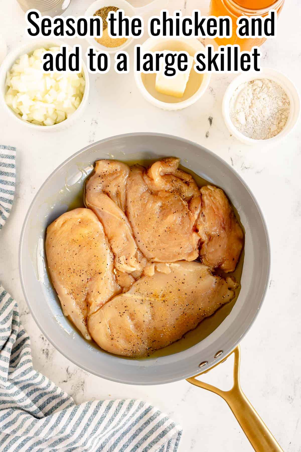 raw chicken in a skillet.
