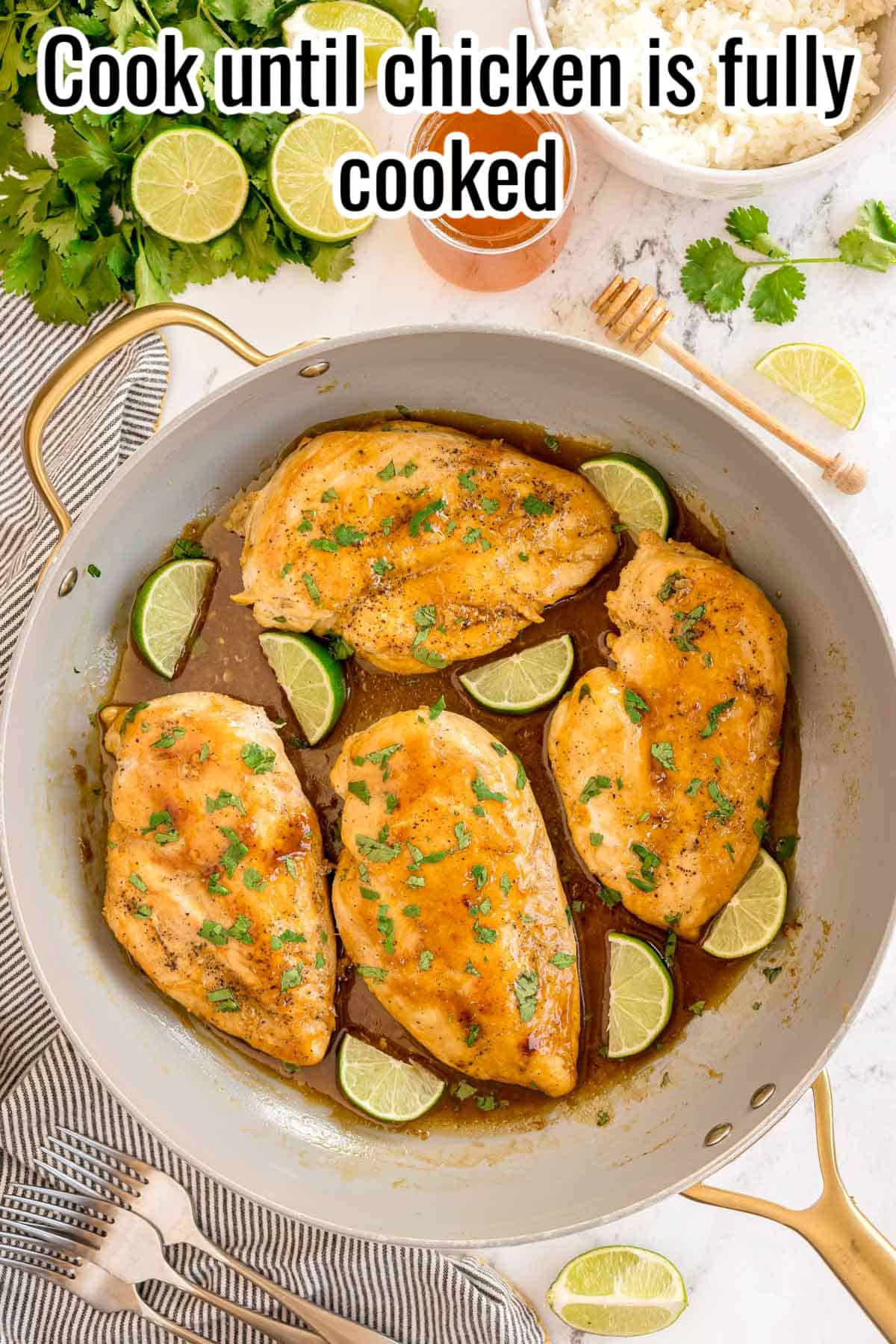 Glazed chicken in a skillet with lime wedges and chopped cilantro. Text on the image says 'Cook until chicken is fully cooked'.