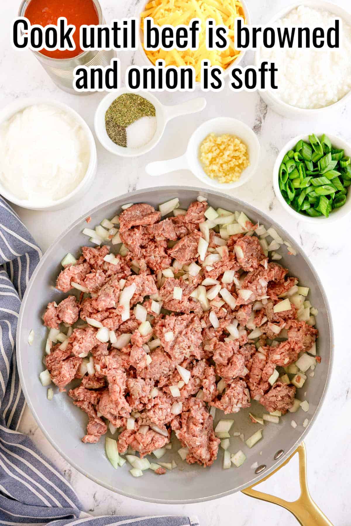A skillet with ground beef and chopped onions. Text on the image says 'Cook until beef is browned and onion is soft'