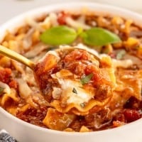 crockpot lasagna soup on a spoon.
